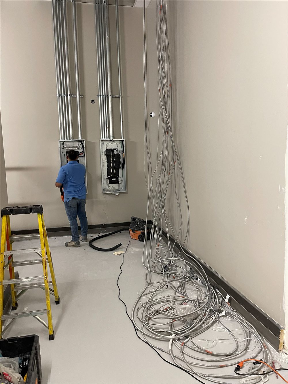 Wired Up electrician testing a circuit with a meter to fix the fault for good