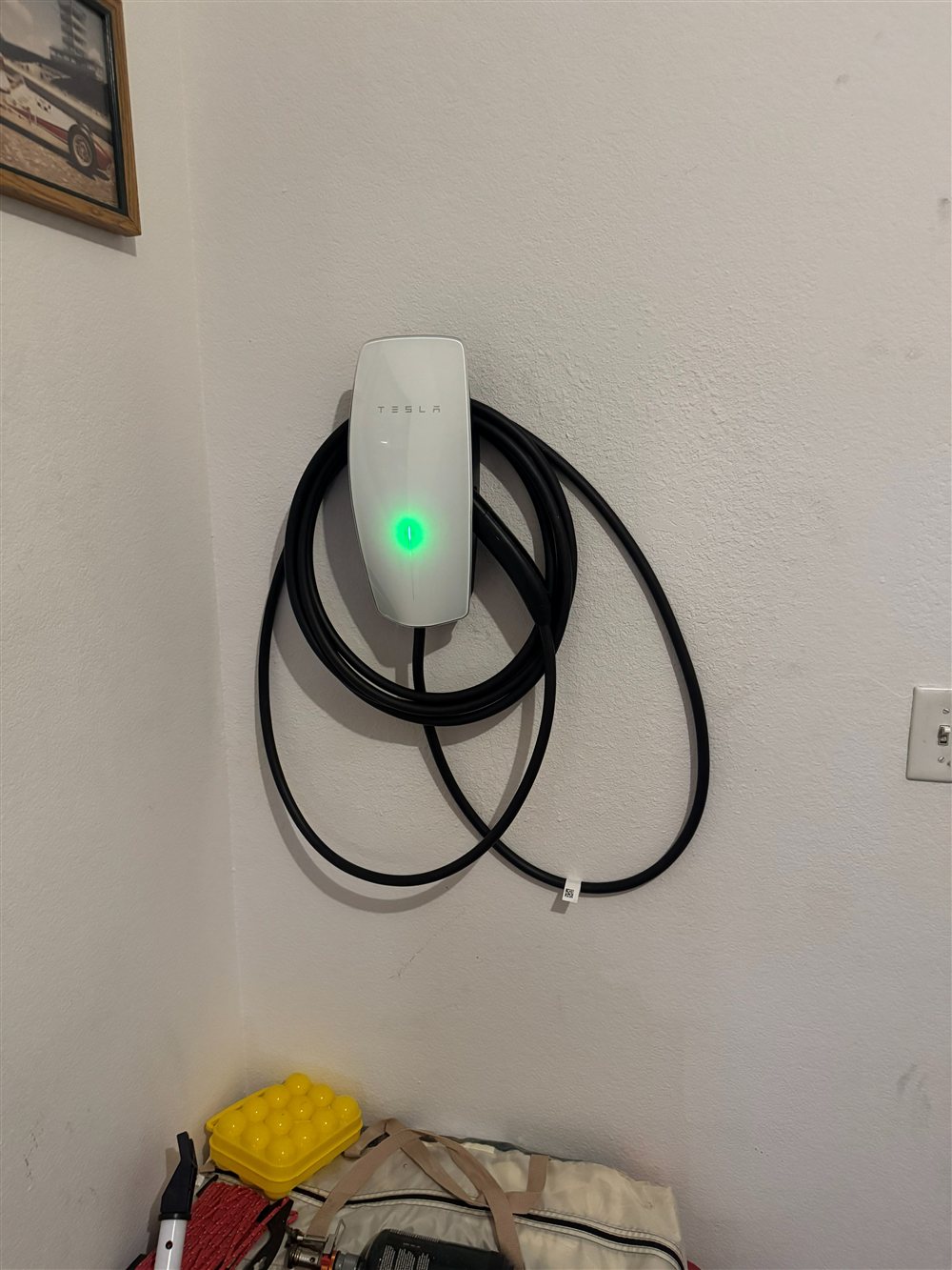 Tesla Wall Connector home EV charger installed in a Las Vegas garage