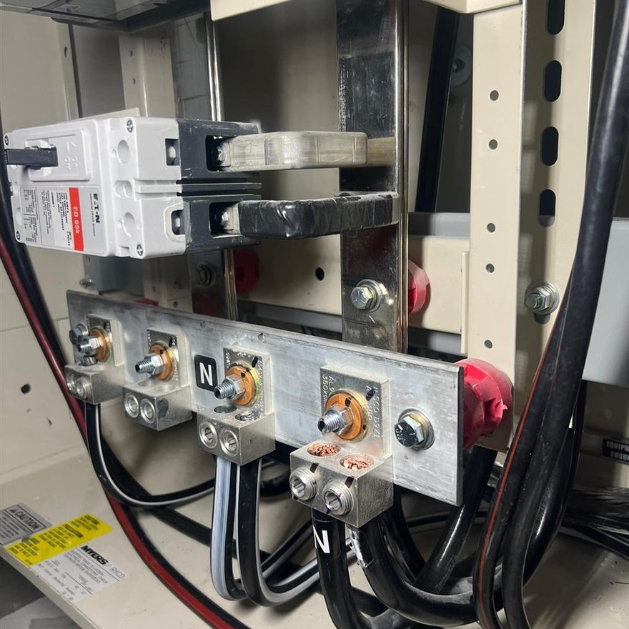 Testing a panel with a meter to confirm an electrical fault in Las Vegas